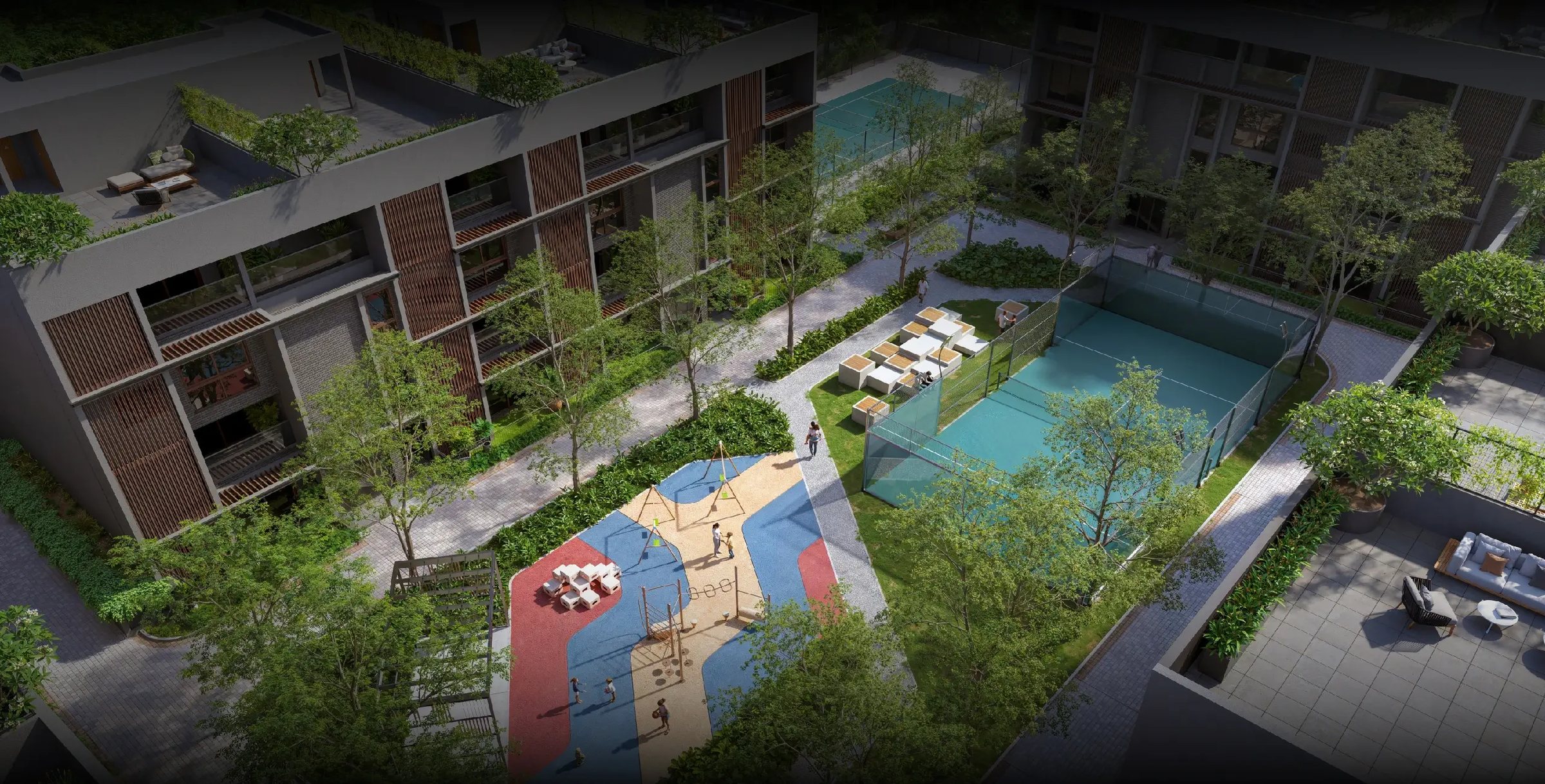 Aerial view of Niwa & Neo — towers around a landscaped courtyard, pool and sports courts